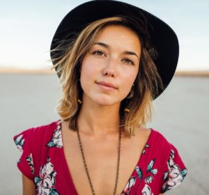 woman in hat in the desert